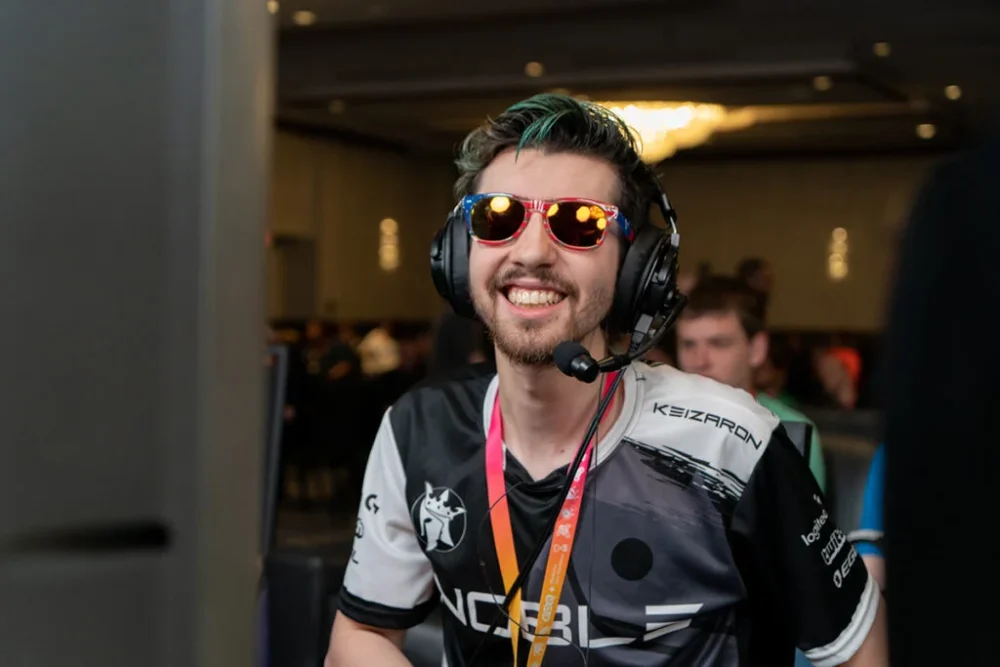27-year-old cancer survivor, Steven Eisner, wearing headphones and sunglasses and smiling widely