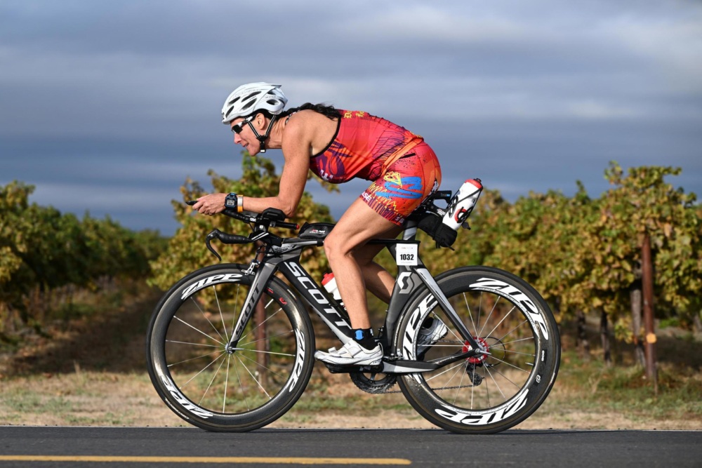 Marion racing by on a bike