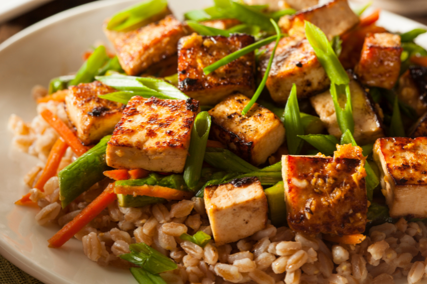 Roasted tofu and scallions served with farro.