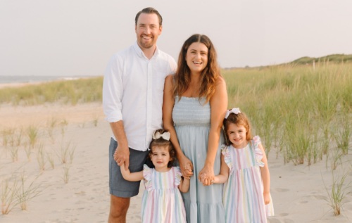 Jackie Wendel at the beach with her husband and two daughters.