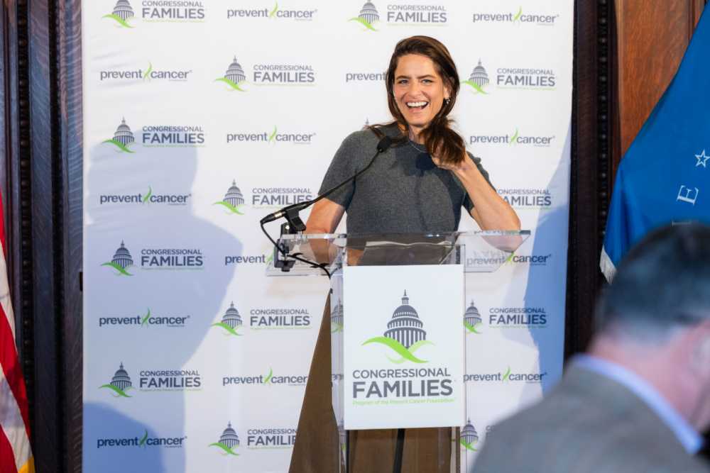 Amanda Peet accepts the Excellence in Cancer Awareness Award.